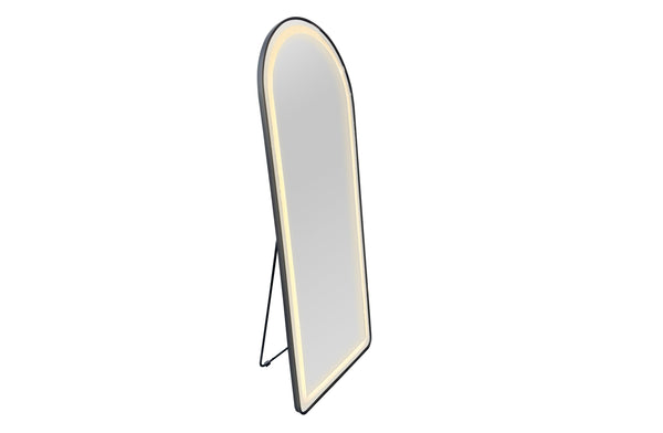 Freestanding black LED mirror with soft warm lighting creating cozy elegant dressing space