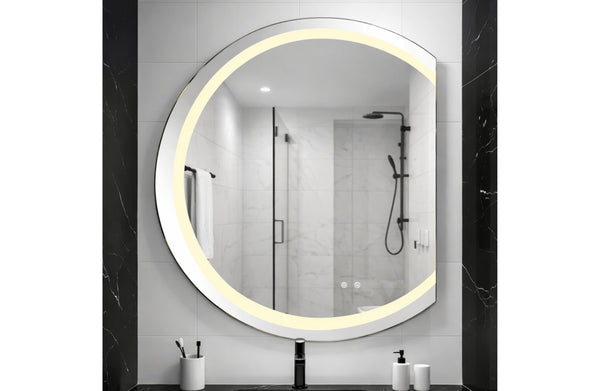 Frameless LED arch mirror glowing above vanity adding bright stylish illumination to modern bathroom