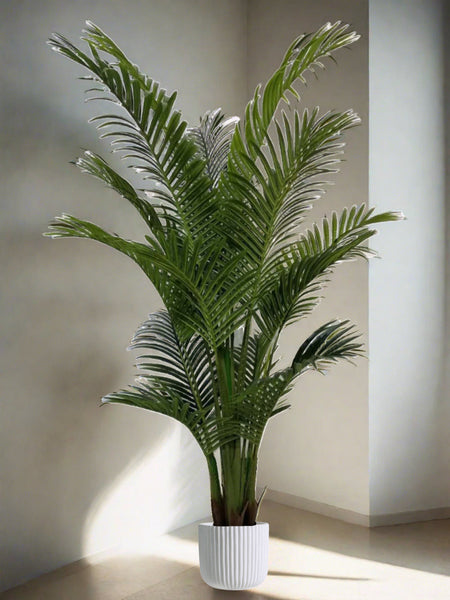  Vibrant artificial palm tree in a modern ribbed white pot for tropical home décor.