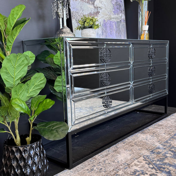 Athens Mirrored Dresser Table in black styled with plants and modern décor in living space