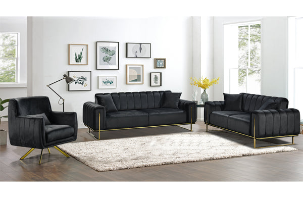 Luxury black velvet sofa collection styled in modern living room with gold trims