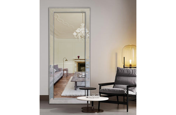 medium silver beaded framed mirror styled in modern living room interior.