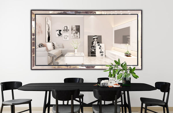 Beaded framed silver mirror hung horizontally in a dining area above table and chairs.