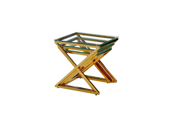 Bella nesting side tables in polished gold frame with clear glass tops, product studio image.