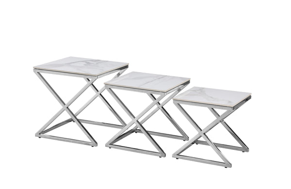 Bella set of three nesting side tables with polished silver frame and elegant marble tops.