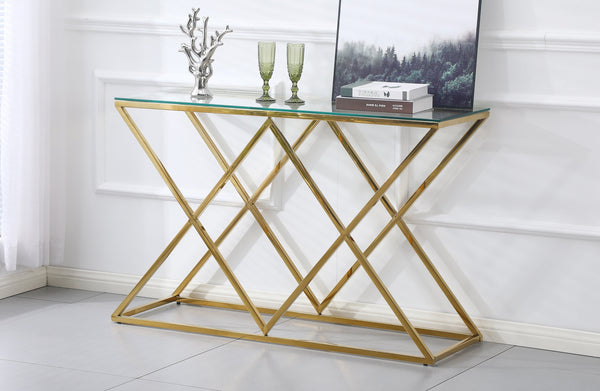 Beverly console table with gold frame and clear glass top styled with décor.