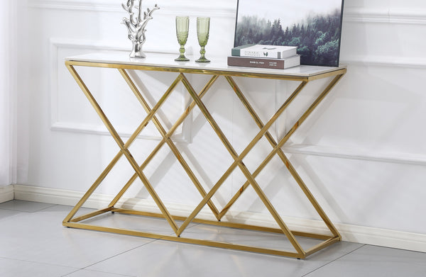 Beverly console table with gold frame and marble top styled with décor in a living room.