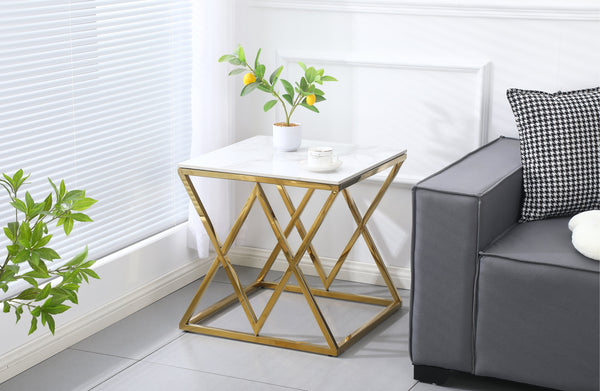 Beverly side table in gold polished frame with white marble stone top, elegant accent.