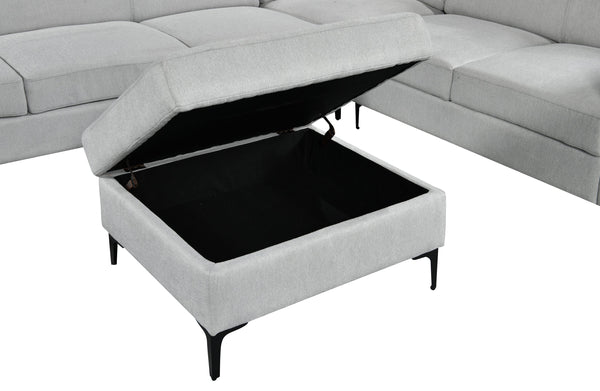 Boston modular ottoman in light grey fabric with open storage compartment and sturdy black legs.