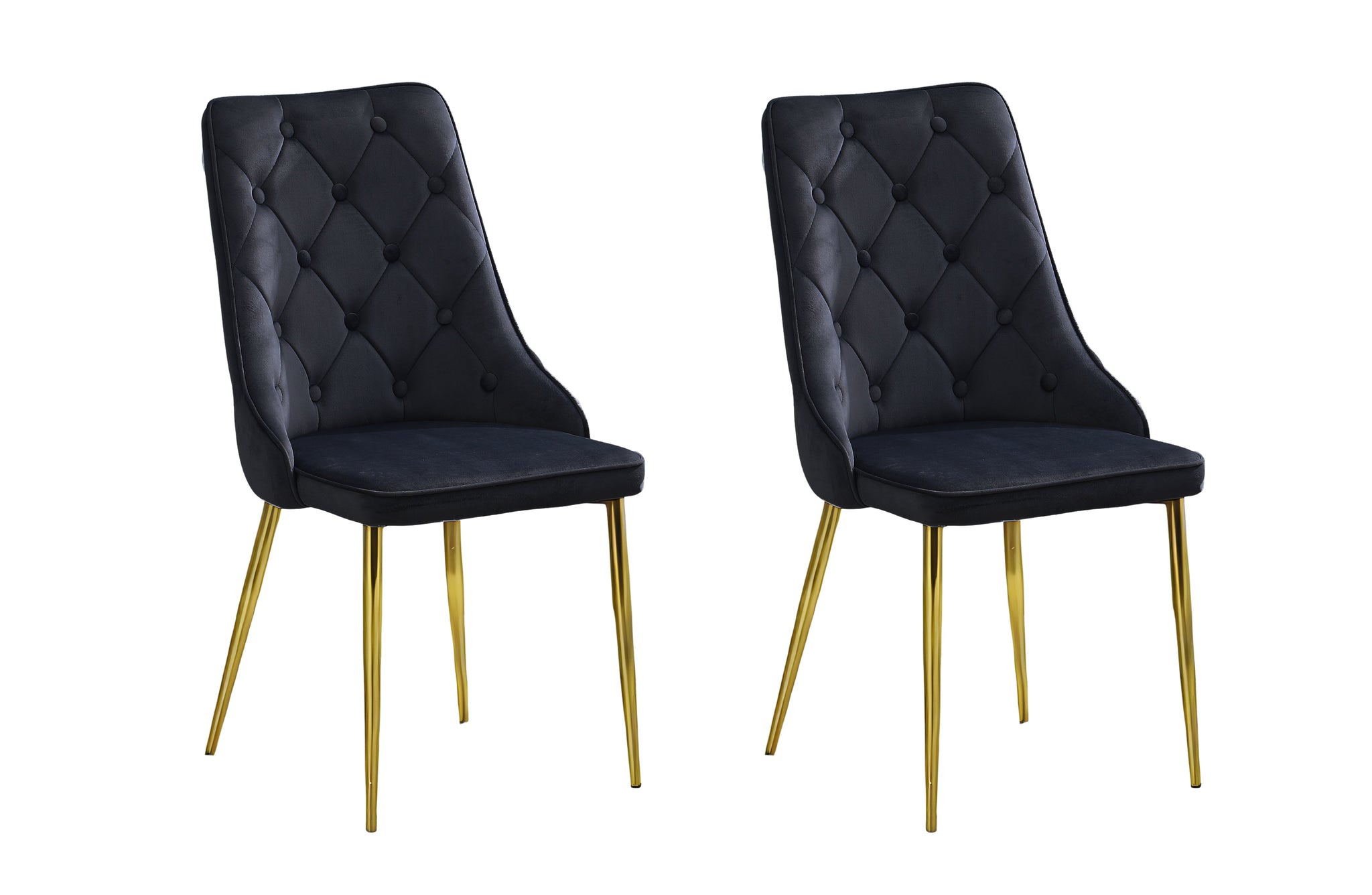 Set of 2 black velvet button tufted dining chairs with gold legs in studio setting.