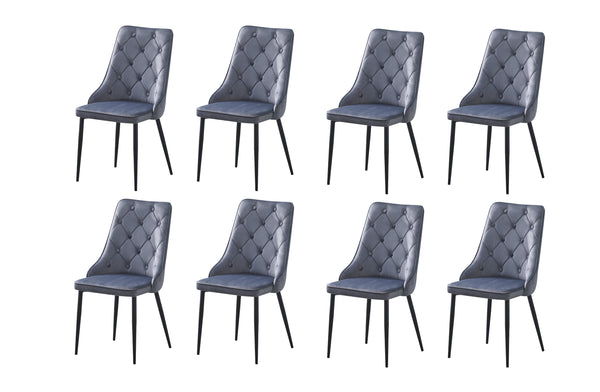 Set of 8 grey velvet button tufted dining chairs with black legs displayed together.