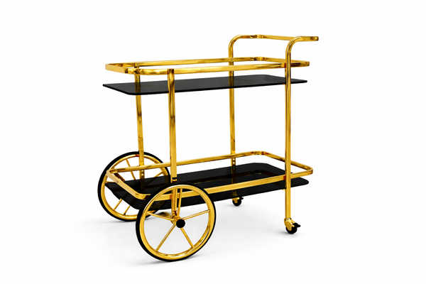 Luxury gold frame bar cart with black glass shelves adding bold elegant serving style