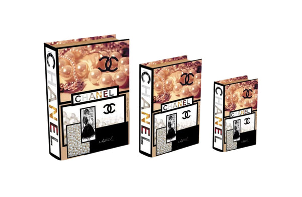 Set of pearl designer faux book storage boxes in small medium and large sizes with black white and pink luxury design.