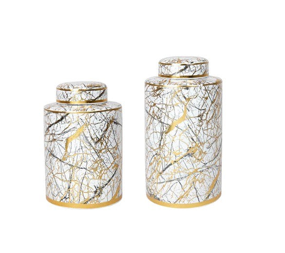 Elegant ceramic ginger jars in gold and white marble pattern, available in two sizes, perfect for decorative or storage use.