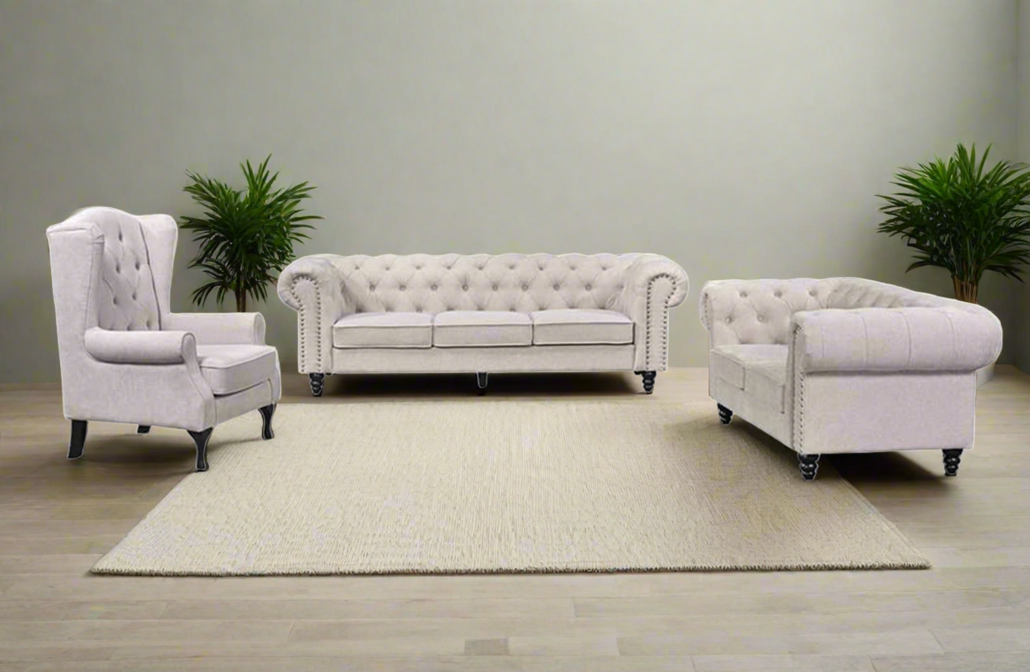 Beige Chesterfield tufted lounge set with three-seater, two-seater and armchair