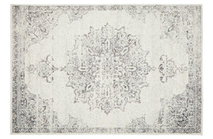 Elegant Chrome Rita Silver Rug featuring ornate geometric and floral motifs in silver, grey, and off-white tones.