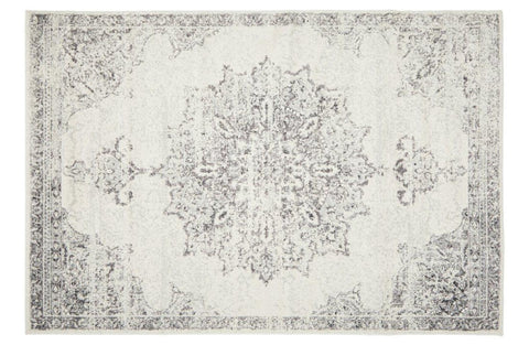 Elegant Chrome Rita Silver Rug featuring ornate geometric and floral motifs in silver, grey, and off-white tones.