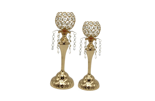 Pair of gold crystal ball candle holders with cascading hanging crystals and hammered metal finish — a dazzling décor accent in large and small sizes.