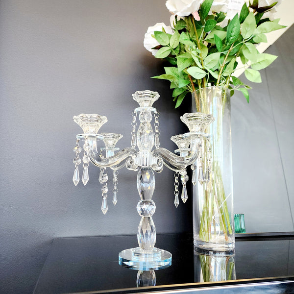Crystal candelabra styled beautifully with flowers for elegant décor settings.