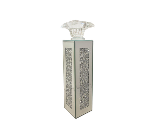 Compact crystal candle holder with mirrored panels, perfect for accents.
