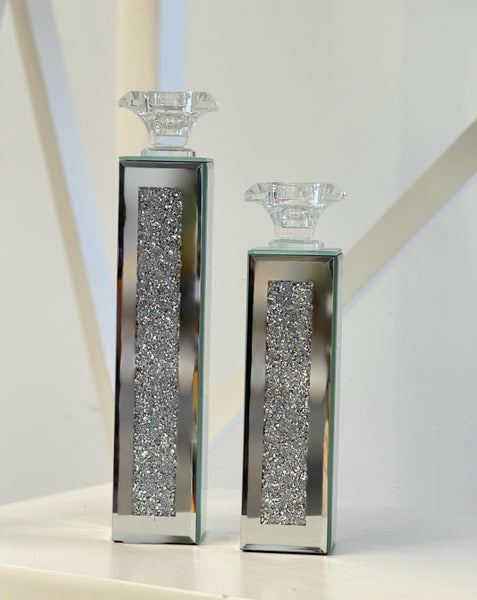 Sparkling crystal candle holders styled beautifully in a modern setting.
