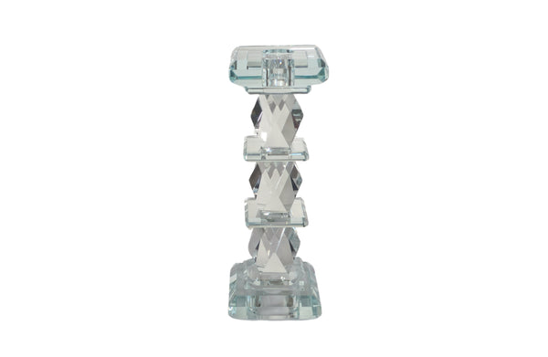 Tall crystal candle pillar with diamond-cut detailing, perfect for an elegant decorative statement.