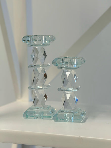 Luxurious crystal candle pillars in two sizes, perfect for creating a glamorous table centerpiece.