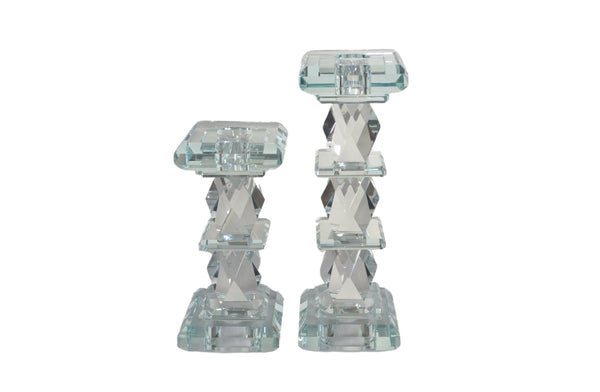 Elegant crystal candle pillar large and small with diamond-cut design, adding sparkle and sophistication to décor.