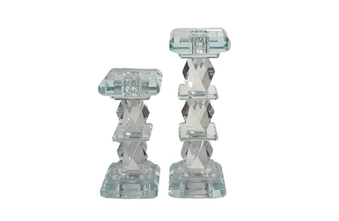 Elegant crystal candle pillar large and small with diamond-cut design, adding sparkle and sophistication to décor.