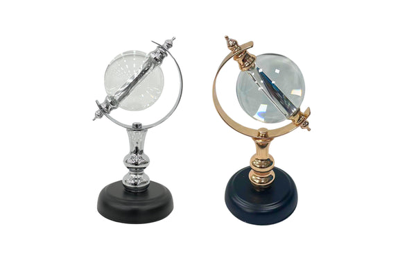 Elegant crystal globes in black with gold and silver finishes.