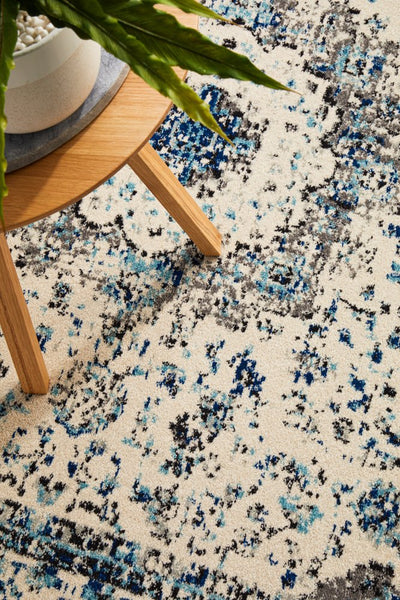 Corner detail of the Evoke 21 White Rug highlighting its fine border and pattern definition.