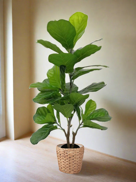 Artificial Fiddle Leaf Plant – 100cm height, placed in a decorative woven basket on a wooden tabletop, showcasing a natural look for home interiors.