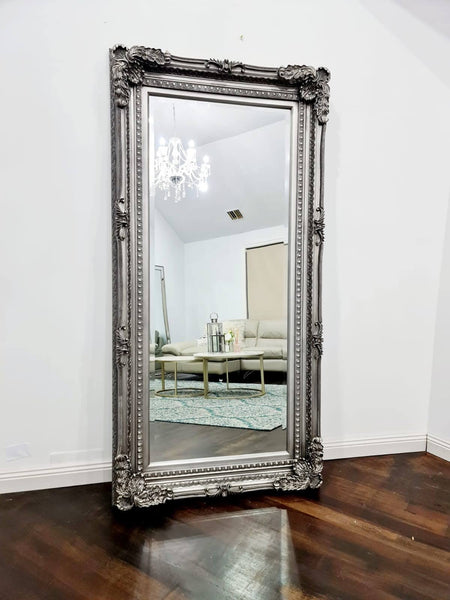 Silver French provincial LUX ornate mirror styled with chandelier, sofa and elegant living décor.