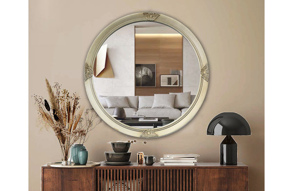 Champagne ornate French provincial round mirror styled with console, dried flowers and modern décor.
