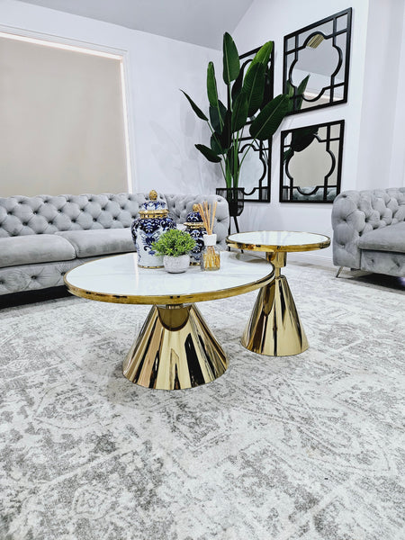 Glam gold coffee and side table set with polished stainless steel frame and white marble top.