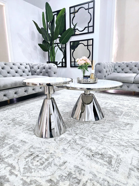 Glam silver coffee and side table set with polished stainless steel frame and white marble top.