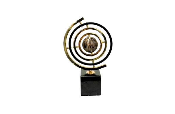 Sleek black and gold globe décor with marble base – a refined modern accent.