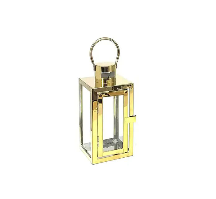 Chic small gold lantern ideal for tabletops or cozy corners.
