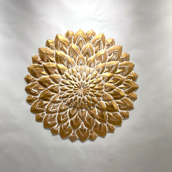 Elegant gold floral wall art displayed on plain background showcasing its intricate design.