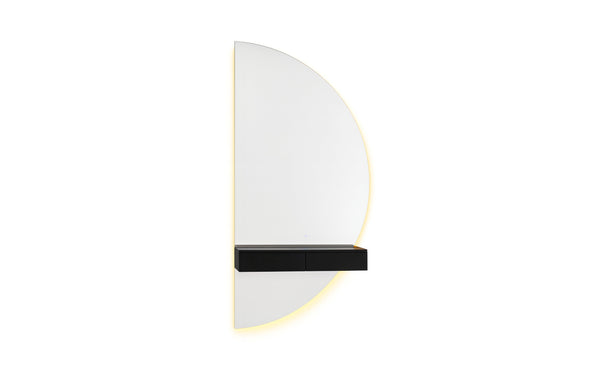 Modern black half moon LED mirror with floating shelf creating warm glow and sleek storage