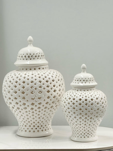 Elegant white ceramic Classic Hampton Urns in large and small sizes with pierced latticework, ideal for refined home styling.