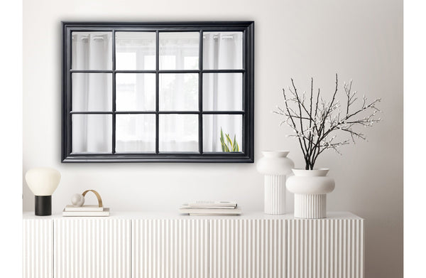 Black Hampton’s medium rectangle mirror styled above a white console with vases.