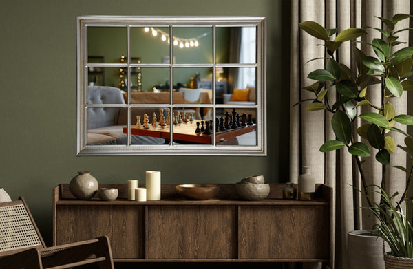 Silver Hampton’s rectangle mirror styled in living room above wooden sideboard.