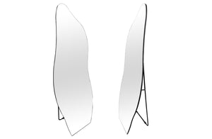 Irregular free standing mirror with sleek frameless design, unique shape and slim metal stand.