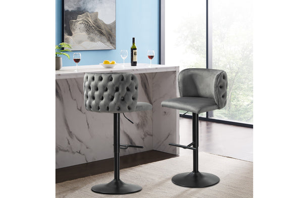 Lara grey velvet swivel bar stools with matte black base styled in modern dining room