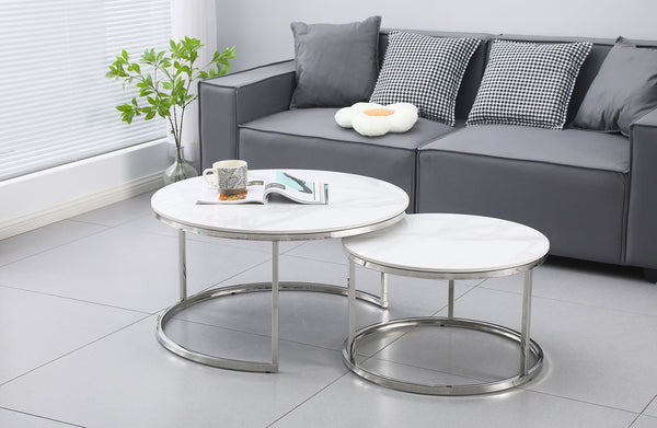 Layla nesting coffee table large set with polished silver frame and marble tops in grey lounge.