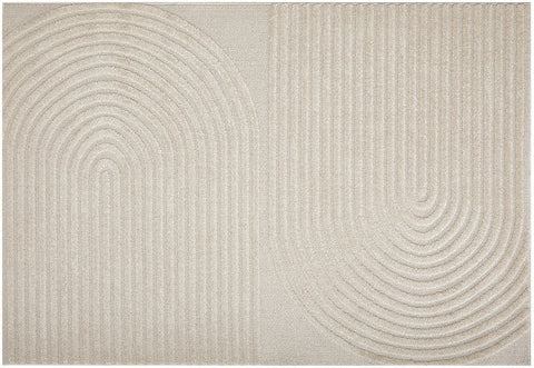  Elegant beige rug with modern textured design, perfect for adding warmth and style to interiors.