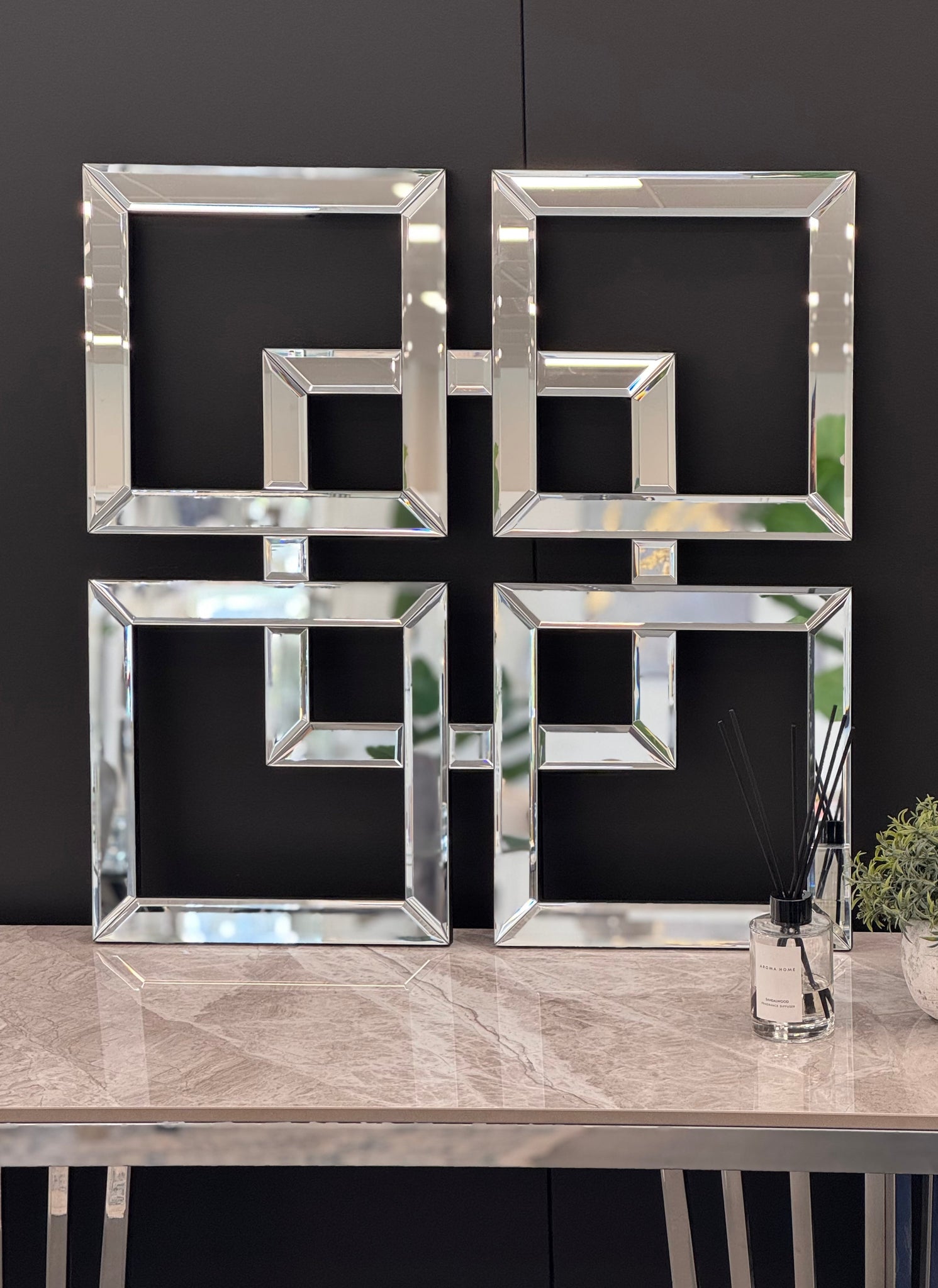 Maddison Square mirror placed above console table, four beveled square frames creating timeless elegance.
