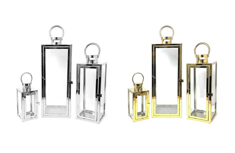 Elegant silver and gold metal lanterns in three sizes for chic home décor.