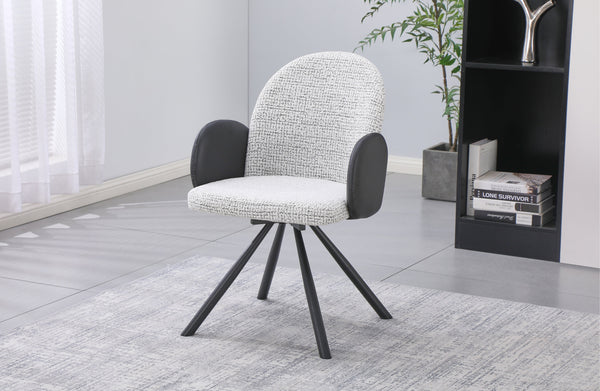 Black swivel dining chair styled in modern space delivering sleek contrast and contemporary comfort